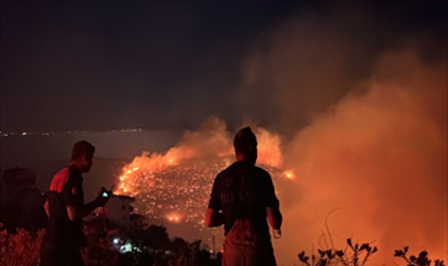 İzmir'in kuzeyinde orman yangını alarmı İzmir'in kuzeyinde orman yangını alarmı