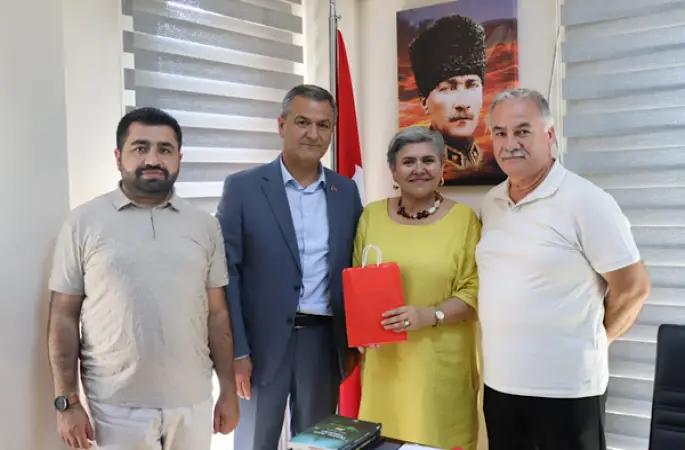 İzmit'te muhtarlara doğum günü ziyareti